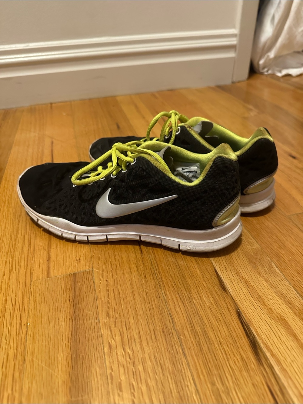Nike Black Sneakers with Neon Yellow Accents